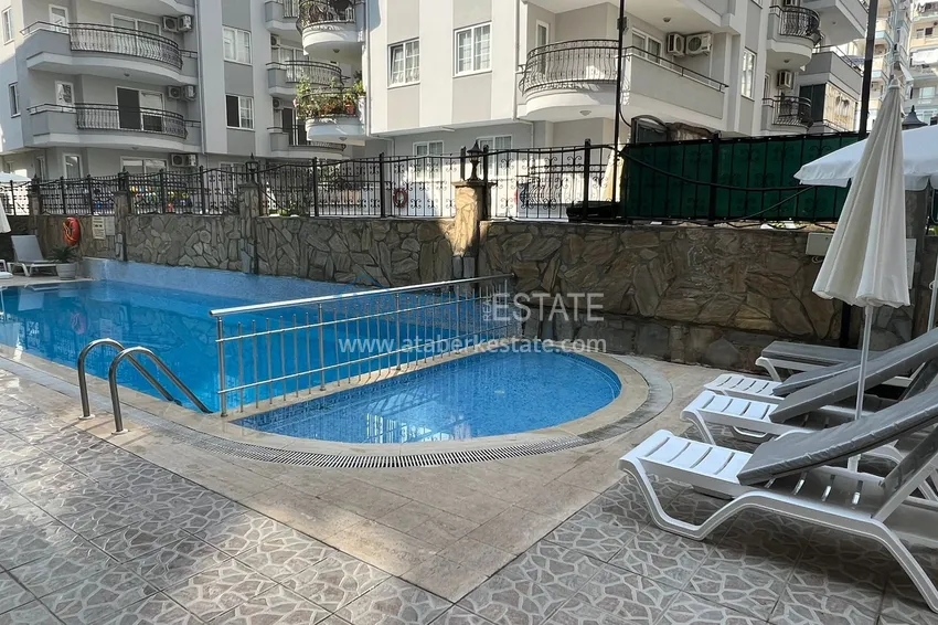 Квартира 2+1 в районе Оба с мебелью и застекленным балконом в комфортабельном жилом комплексе 3 