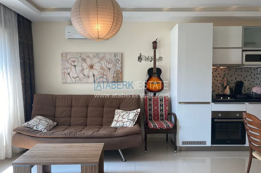 Приобрести Квартира в Оба с мебелью и застекленным балконом в уютном жилом комплексе 4 