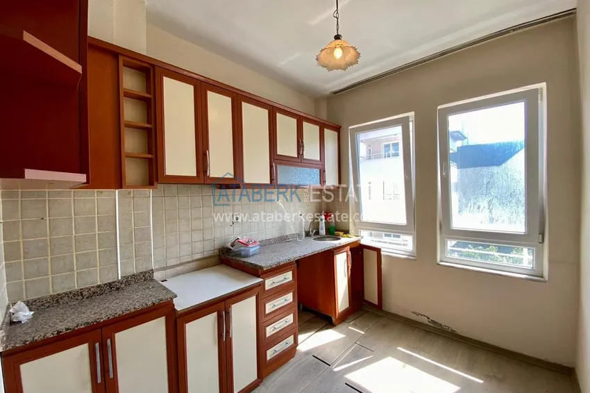 Приобрести Линейная квартира с 3 спальнями и боковым видом на море в районе Оба 4 