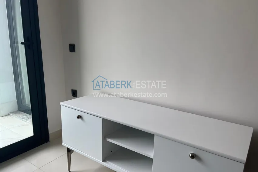 Приобрести Квартира в Махмутларе меблированная в современном новом комплексе 4 