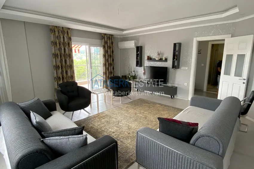 Приобрести Трехкомнатная квартира с современным интерьером в Алании – горный район Тепе 5 