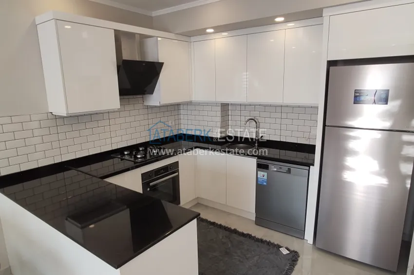 Приобрести Двухкомнатная квартира с новой мебелью в Алании район Авсаллар - Новостройка 4 