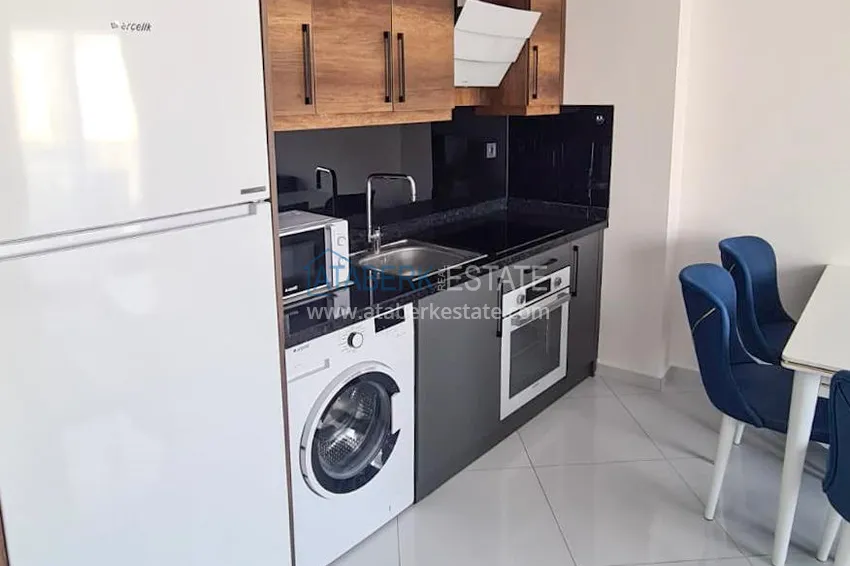 Приобрести Квартира с видом на горы в Махмутларе с мебелью 4 