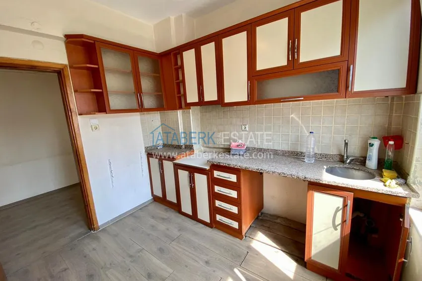 Приобрести Линейная квартира с 3 спальнями и боковым видом на море в районе Оба 5 