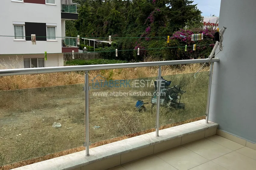 Приобрести Двухкомнатная квартира в Алании - район Оба в жилом доме городского типа 6 