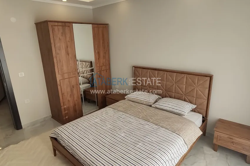 Приобрести Двухкомнатная квартира с новой мебелью в Алании район Авсаллар - Новостройка 6 