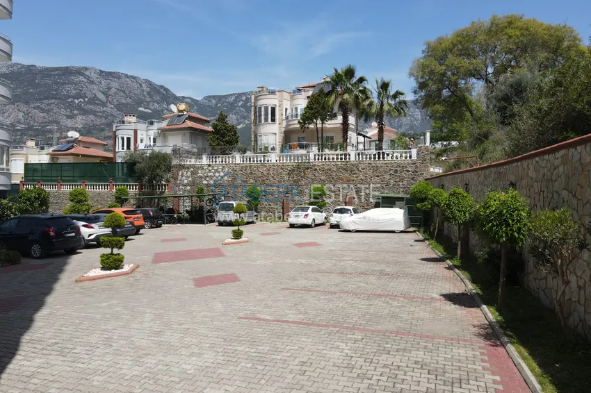 Видовые апартаменты с 2 спальнями в районе Махмутлар в благоустроенном комплексе 7 