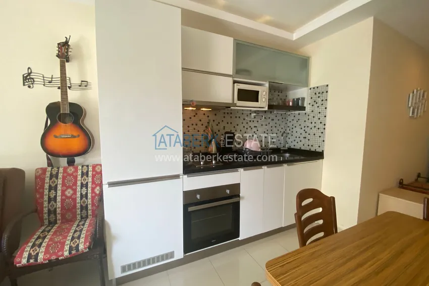 Приобрести Квартира в Оба с мебелью и застекленным балконом в уютном жилом комплексе 6 