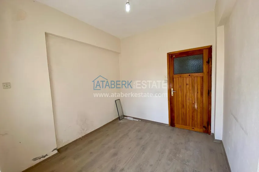 Приобрести Линейная квартира с 3 спальнями и боковым видом на море в районе Оба 7 