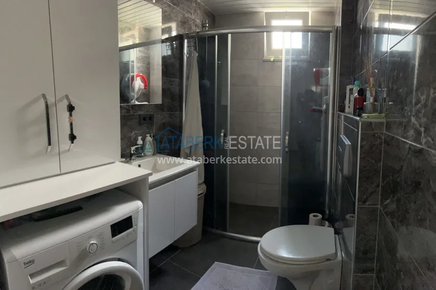 Приобрести Меблированная квартира с выходом в сад и видом на горы в Алании, район Оба в уютном жилом комплексе 7 