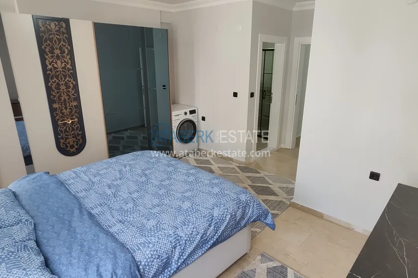 Приобрести Квартира в Махмутларе по приемлемой цене - трехкомнатная с мебелью, вторая береговая 9 