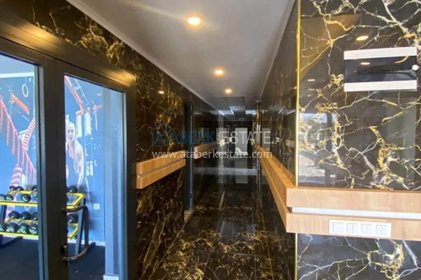 Двухкомнатная квартира с новой мебелью в Алании район Авсаллар - Новостройка 12 