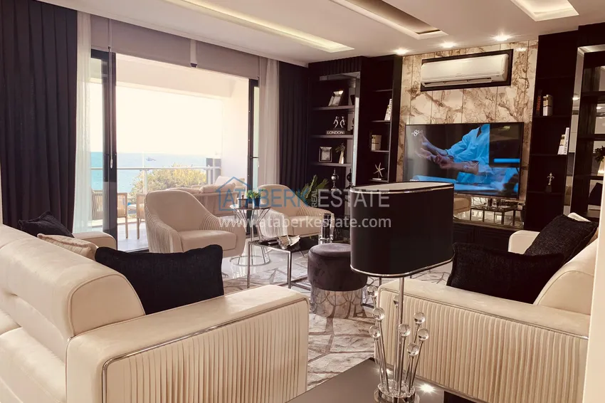 Приобрести Стильная квартира в историческом центре Алании с дизайнерским интерьером и видом на порт 9 