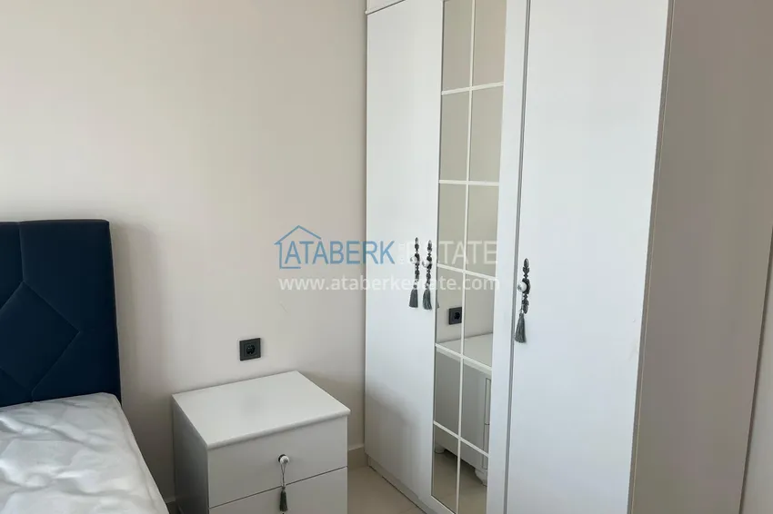 Приобрести Квартира в Махмутларе меблированная в современном новом комплексе 8 