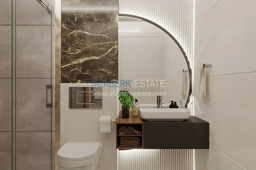 Приобрести Новый строящийся бутик-комплекс в районе Окурджалар - 200 метров от моря 9 