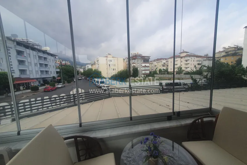 Приобрести Квартира в центре района Оба – Алания с мебелью и застекленным балконом 9 