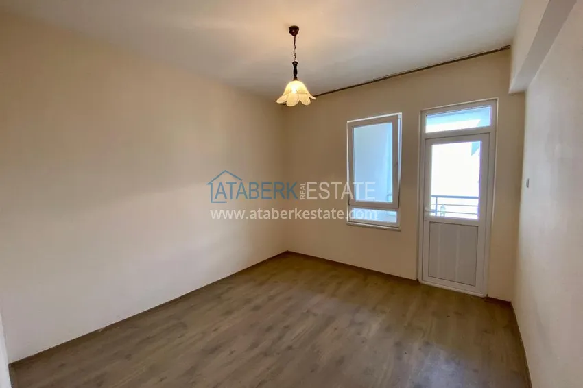 Приобрести Линейная квартира с 3 спальнями и боковым видом на море в районе Оба 8 