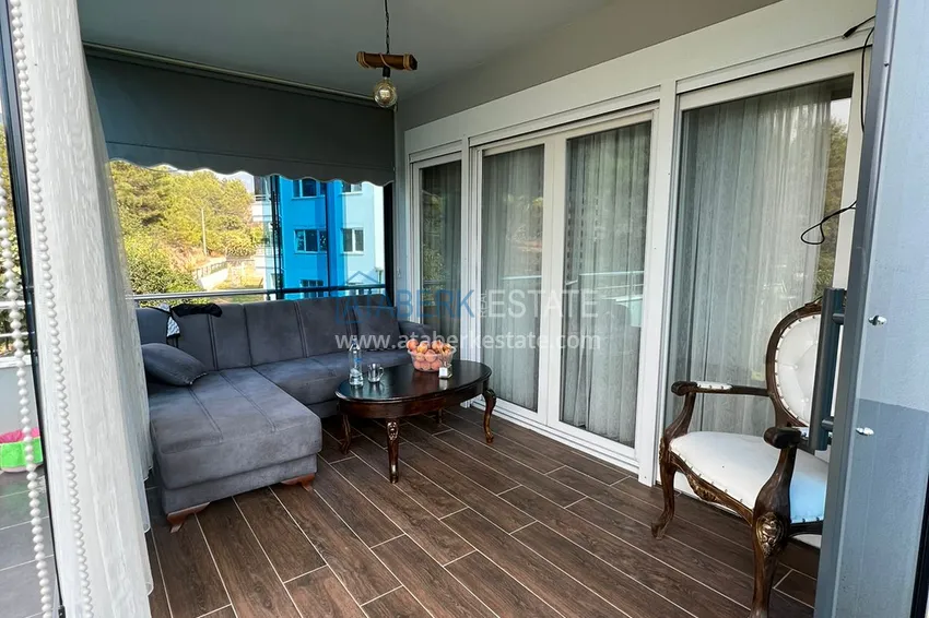 Приобрести Меблированная квартира с выходом в сад и видом на горы в Алании, район Оба в уютном жилом комплексе 9 