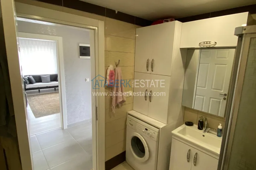 Приобрести Трехкомнатная квартира с современным интерьером в Алании – горный район Тепе 10 