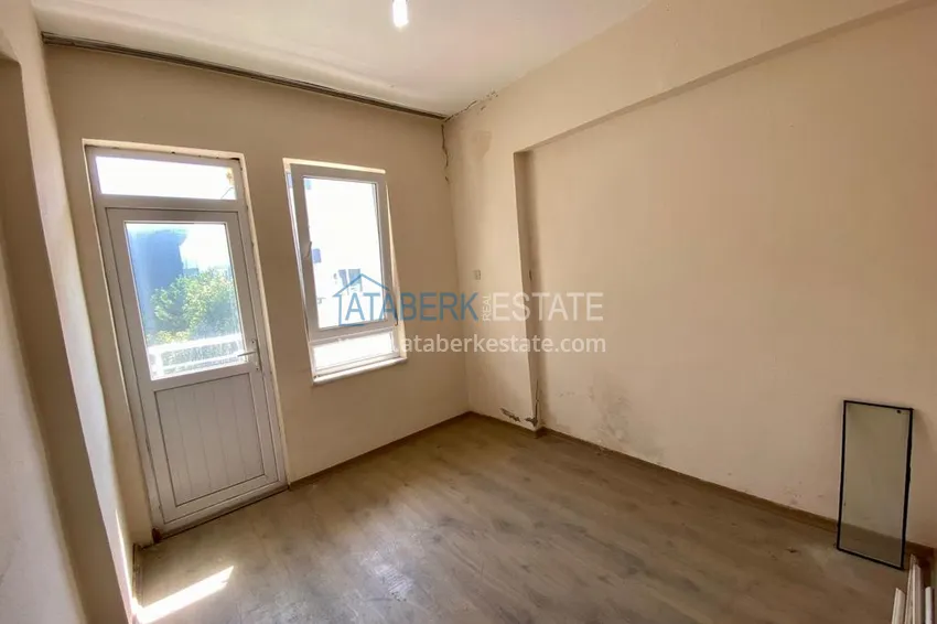 Приобрести Линейная квартира с 3 спальнями и боковым видом на море в районе Оба 9 