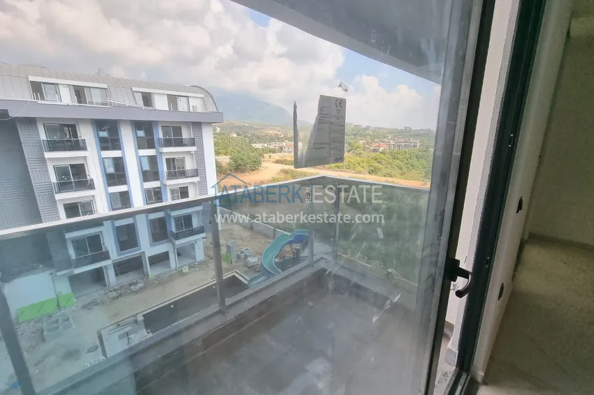 Приобрести Квартиры в Алании - район Оба, от инвестора в строящемся комплексе 26 