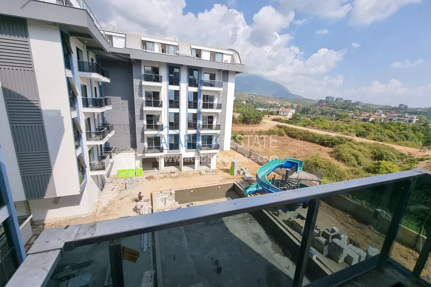 Приобрести Квартиры в Алании - район Оба, от инвестора в строящемся комплексе 39 