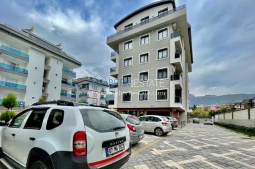 Квартира с выходом в сад, видом на горы и новой мебелью в районе Оба - Алания 10