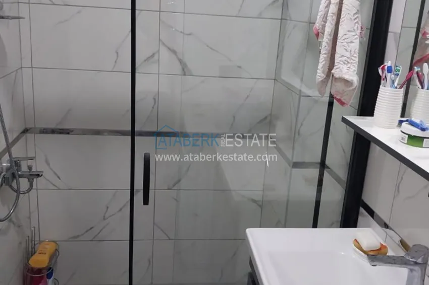 Приобрести Квартира с выходом в сад, видом на горы и новой мебелью в районе Оба - Алания 12