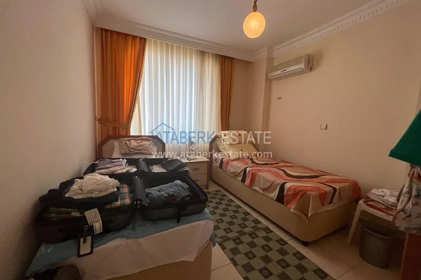 Приобрести Квартира 2+1 в районе Оба с мебелью в комплексе европейского типа 11 