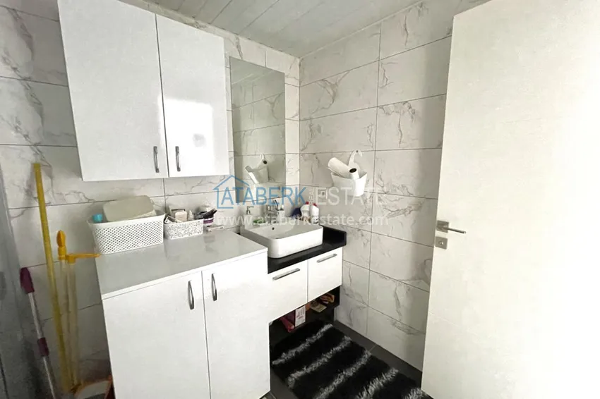 Приобрести Квартира в Махмутларе с мебелью и застеклённым балконом в молодом современном комплексе 10 