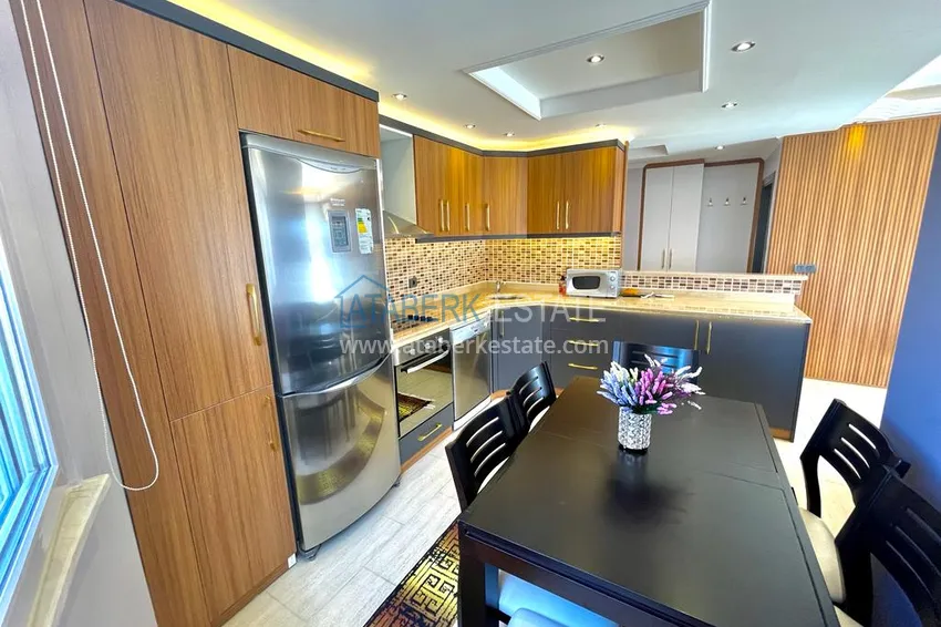 Приобрести Квартира меблированная в Махмутларе с видом на море и горы 12