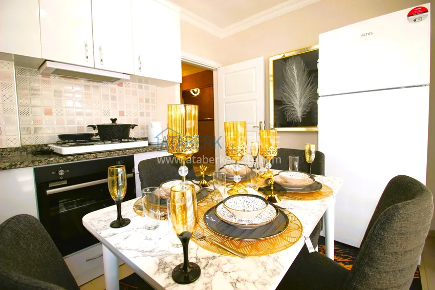 Приобрести Трехкомнатная квартира с новой мебелью в Джикджилли - район ТЦ Аланиум 12