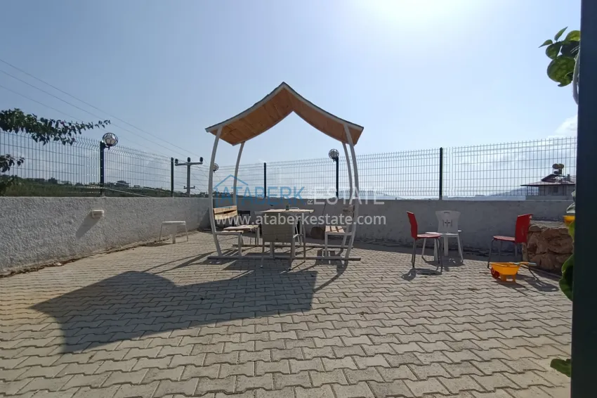 Квартира с выходом в сад и застеклённым балконом в Оба в уютном жилом комплексе 15 