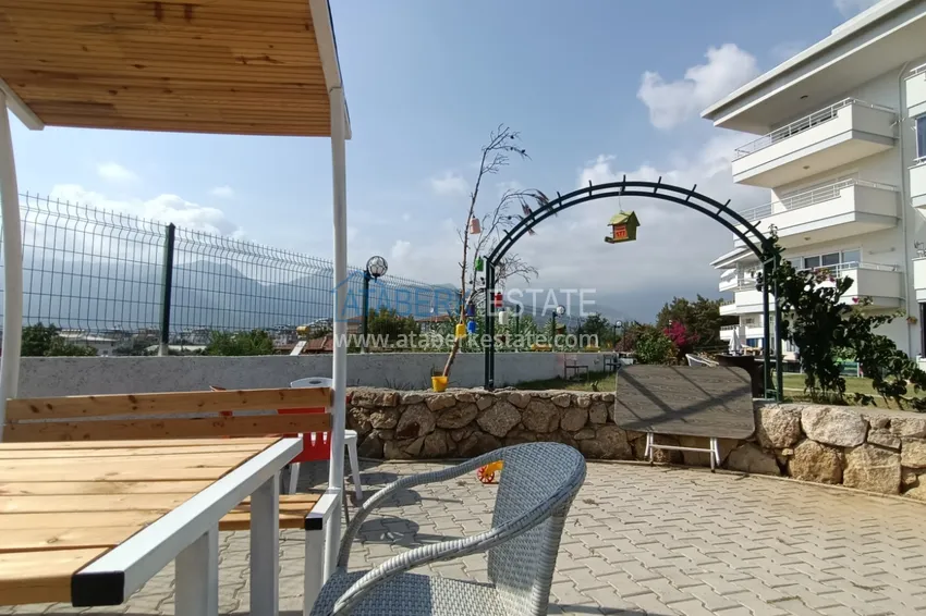 Квартира с выходом в сад и застеклённым балконом в Оба в уютном жилом комплексе 16 