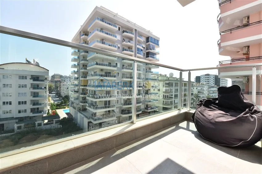 Приобрести Квартира в Махмутларе меблированная с видом на горы в комплексе комфорт-класса 12 