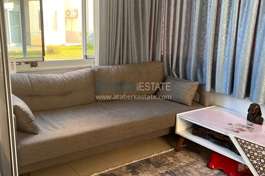 Приобрести Меблированная квартира с видом на горы в Алании, район Оба в уютном жилом комплексе 12