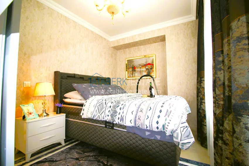 Приобрести Трехкомнатная квартира с новой мебелью в Джикджилли - район ТЦ Аланиум 13