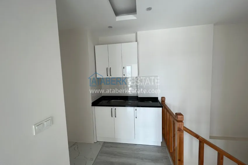 Приобрести Двухэтажный пентхаус с открытым видом на горы в районе Оба 14