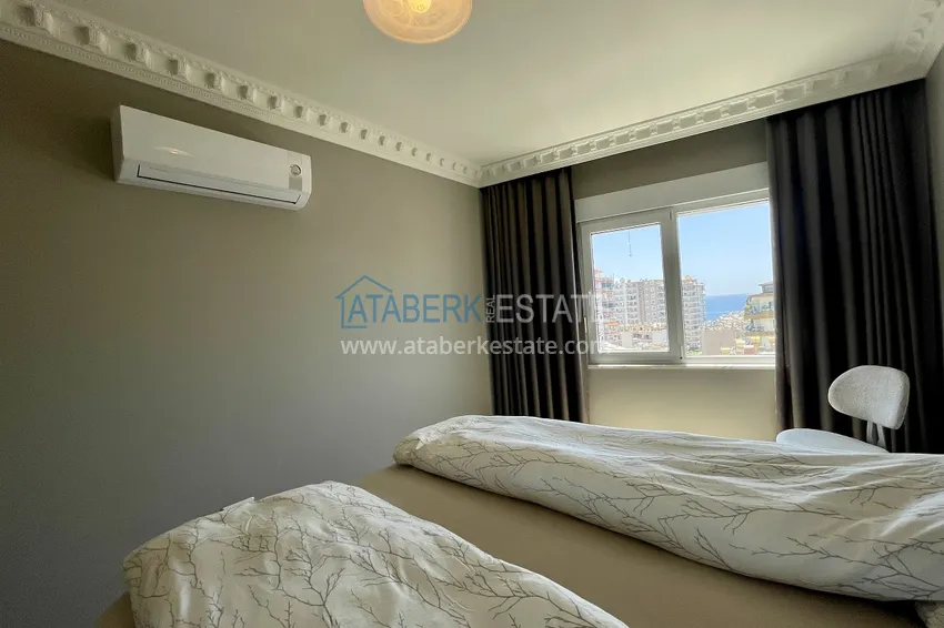 Приобрести Квартира 2+1 с новой мебелью и видом на море в уютном комплексе - Махмутлар 13