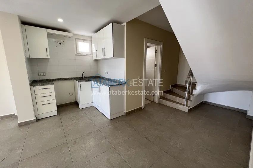 Приобрести Дуплекс 2+1 в молодом комплексе - центр Алании, район пляжа Клеопатра 4