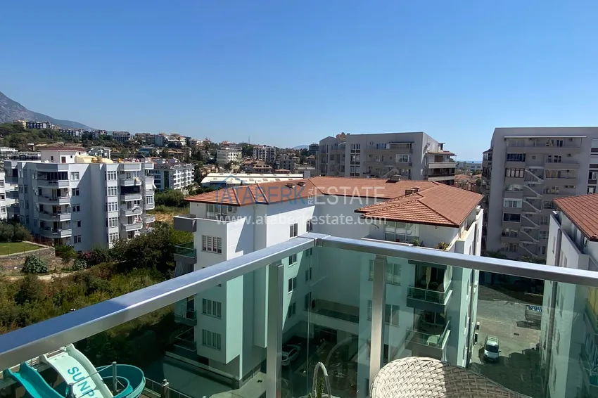 Приобрести Квартира с двумя спальнями, мебелью, видом на море и горы – Тосмур, Алания 14