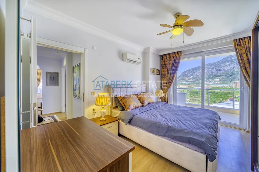 Приобрести Стильная видовая квартира в районе Махмутлар Алания 14 