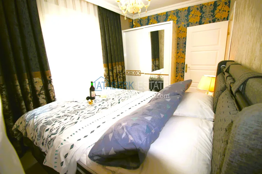 Приобрести Трехкомнатная квартира с новой мебелью в Джикджилли - район ТЦ Аланиум 15