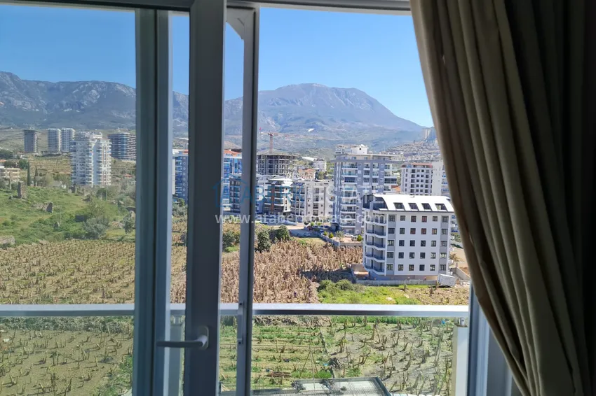 Приобрести Квартира в Махмутларе двухкомнатная с мебелью и видом на море и горы 15