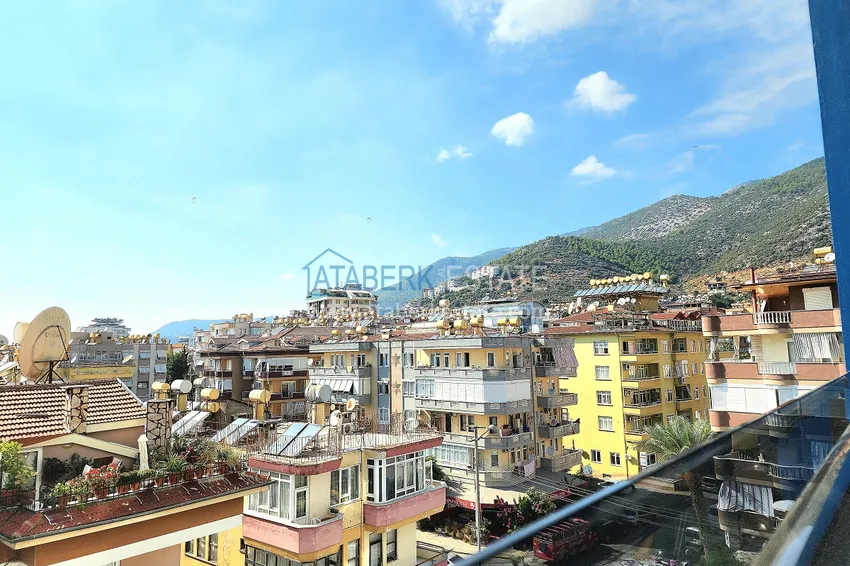 Приобрести Двухкомнатная меблированная квартира с видом на горы в Алании, районе пляжа Клеопатра 16 