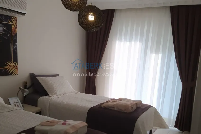 Приобрести Квартира с мебелью и застекленным балконом в районе Оба - Алания 19 