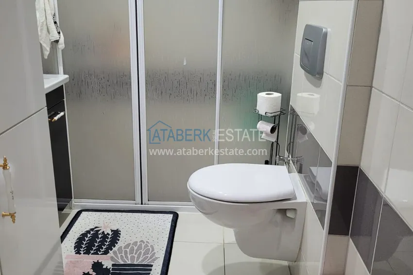 Приобрести Квартира с выходом в сад и застеклённым балконом в Оба в уютном жилом комплексе 15 