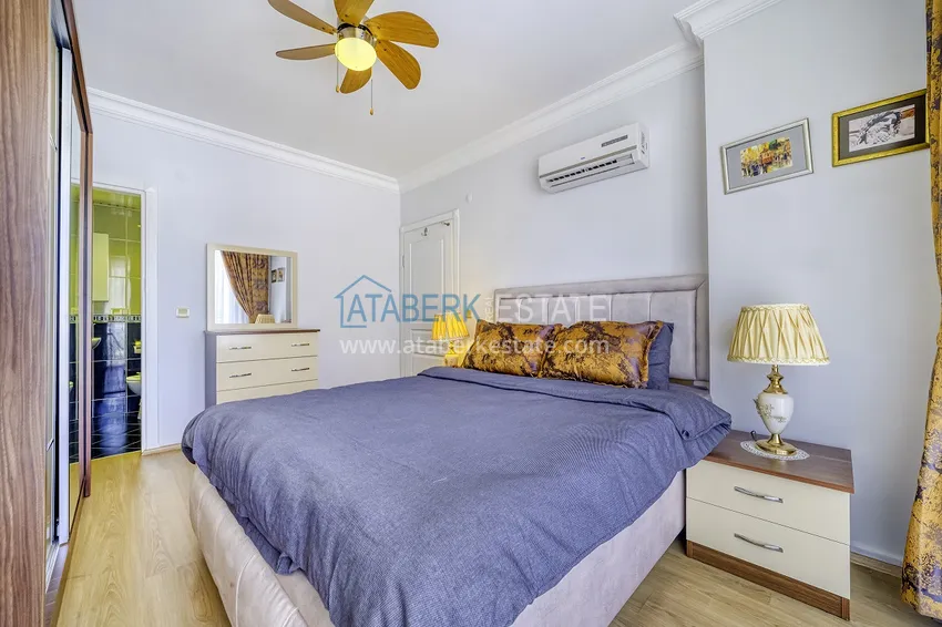 Приобрести Стильная видовая квартира в районе Махмутлар Алания 15 