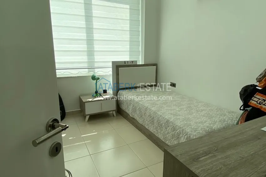 Приобрести Квартира с двумя спальнями, мебелью, видом на море и горы – Тосмур, Алания 16