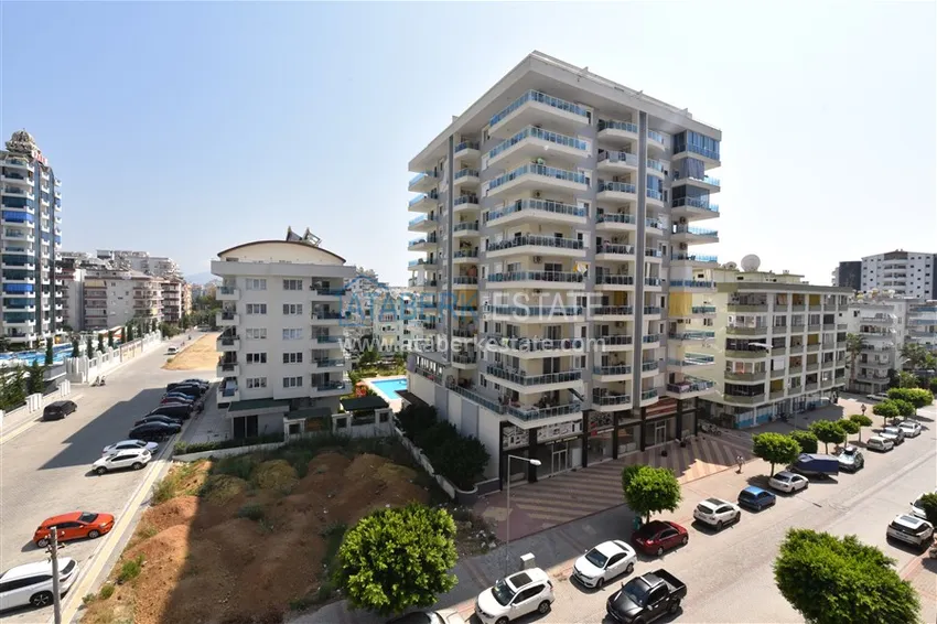 Приобрести Квартира в Махмутларе меблированная с видом на горы в комплексе комфорт-класса 16 